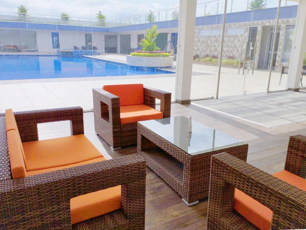 Hotel Royal Elim International Cali Eksteriør billede WOVEN PE rattan